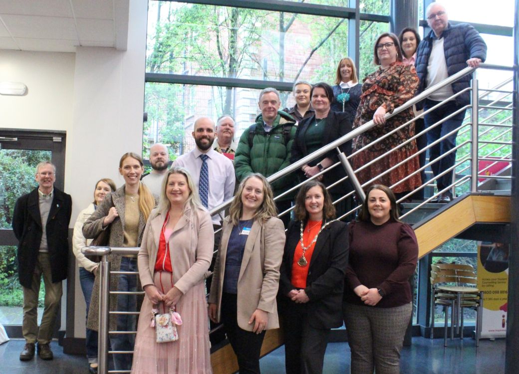 Visitors from Lisburn Chamber gather on the stairs at SERC Lisburn Campus foyer